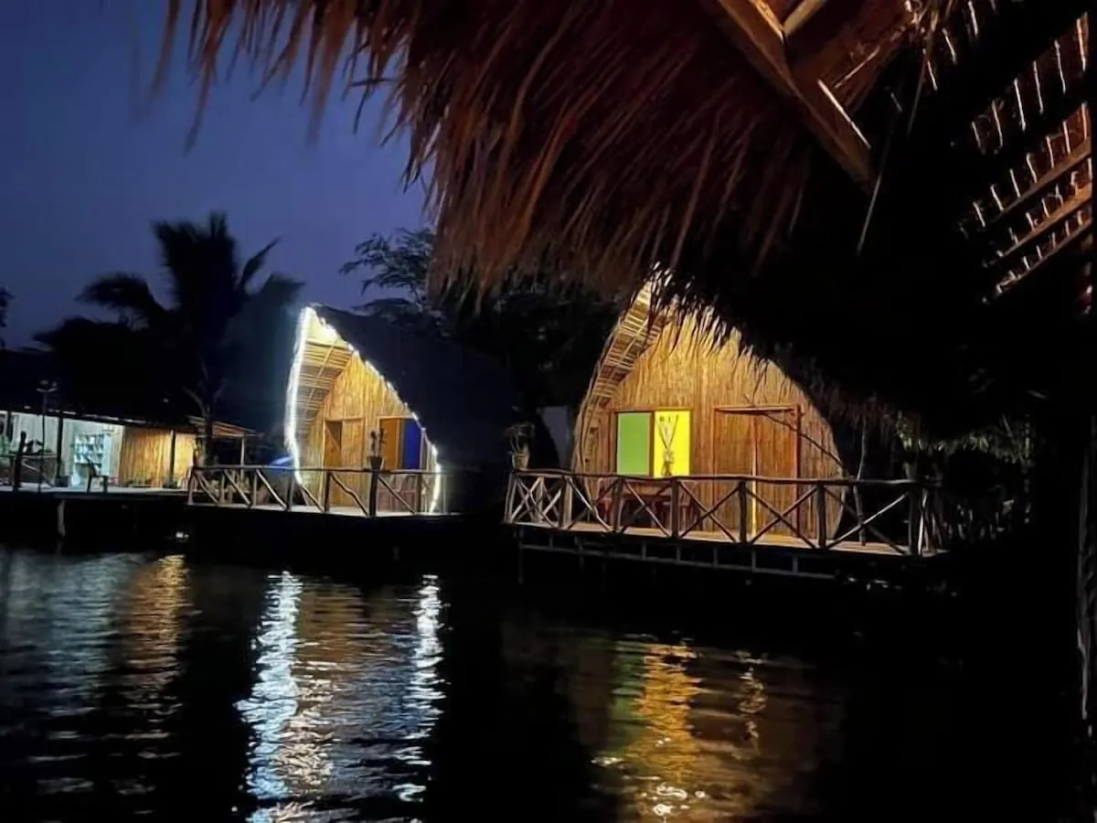 Floating bungalows at night