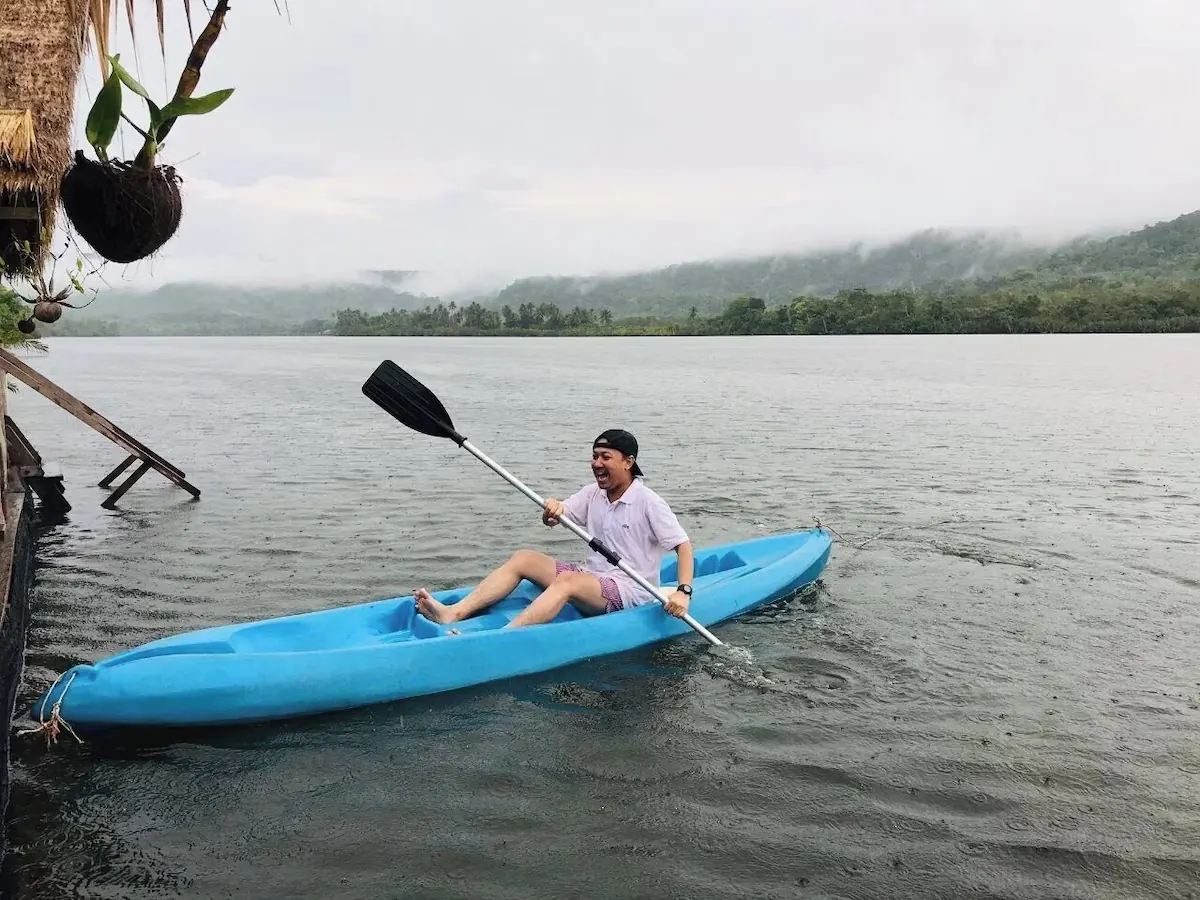 Solo kayak on a misty river
