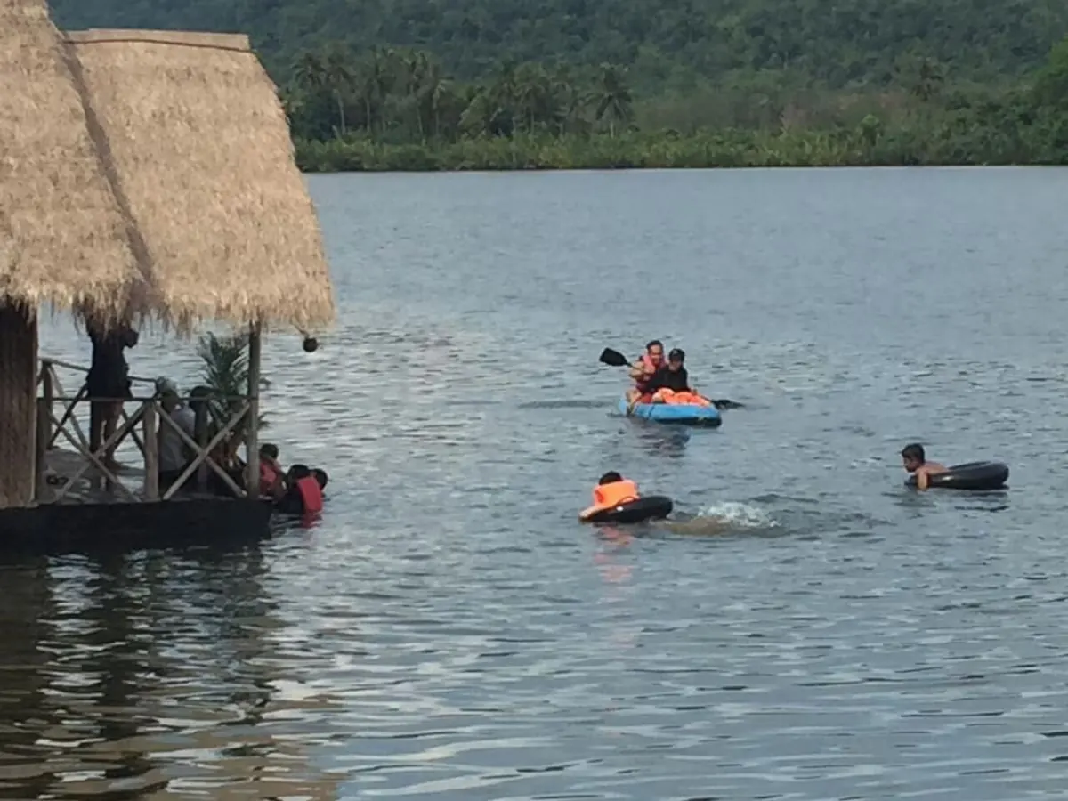 Swimming beside the bungalows